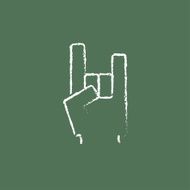 Rock and roll hand sign icon drawn in chalk