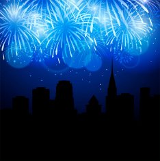 Fireworks lighting up the sky behind town houses N5