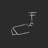 Outdoor surveillance camera icon drawn in chalk