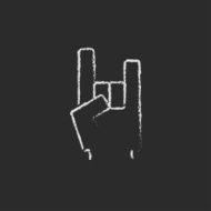 Rock and roll hand sign icon drawn in chalk N2