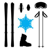 Set of skiing equipment silhouette with snowflake