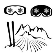 Set of skiing glasses and ski in the hillock