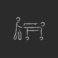 Man pushing stretchers icon drawn in chalk N2