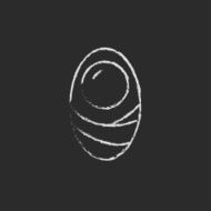 Infant wrapped in swaddling clothes icon drawn chalk