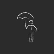 Businessman with umbrella icon drawn in chalk N2