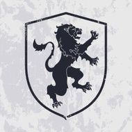 Lion in shield on grunge background - heraldic style