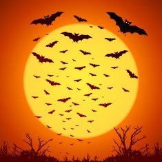 Black bats silhouettes on big yellow moon at orange background
