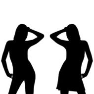 women in dress and pants taking laying