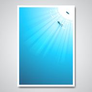 Diver in sea and sun rays pass through the water