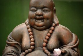 bronze buddha statue in the garden