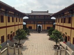 blue sky and white clouds above the temple