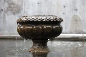 fountain, stone carved vase in pool, china, tibet