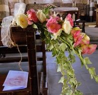 flowers in the church for the wedding ceremony
