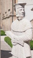 statue of a man with a book