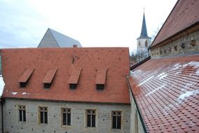 brown church roof with the snow
