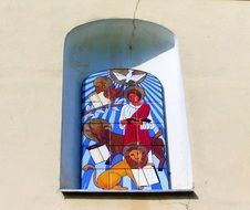 tile mosaic drawing on a church window