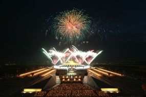 fireworks over a buddhist temple