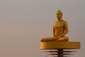 golden buddha on the dais