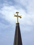 strikingly beautiful gold cross