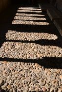 church shadow on a stone