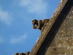 sculpture on the roof of the church