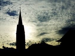 silhouette of church steeple at sunset