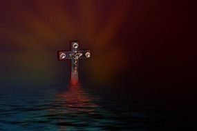 cross with a crucifix in the water