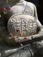 Stone figure of buddha in relaxation
