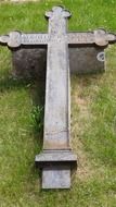 gray cross in christian cemetery