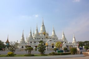 white buddhist temple on a sunny day