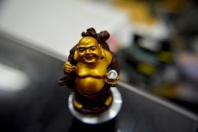 small golden buddha statue