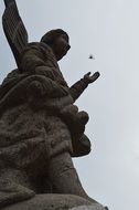 big statue of angel against the sky