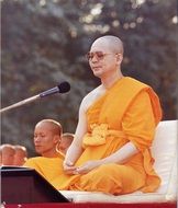 Buddhist leader at the microphone