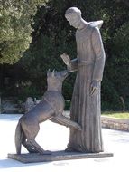 the dog and the monk statue