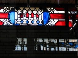 blue, red and white stained glass window