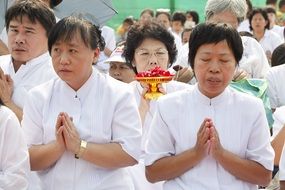 Buddhists pray in Thailand