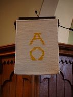 symbols of alpha and omega