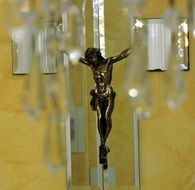 dark crucifix among crystals