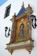 religious mosaic on the wall of a building in Cadiz, Spain