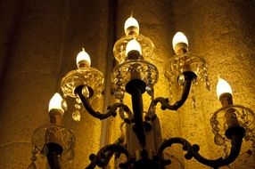 candlestick on the church wall