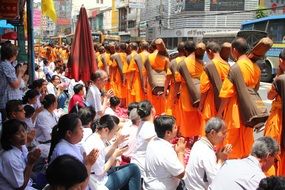 Walking Buddhist monks at the ceremony