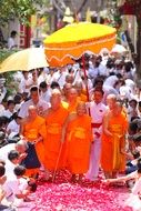 supreme patriarch buddhists walking on a parade