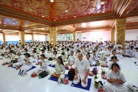 meditating people in temple