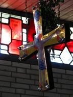 cross hanging on chains