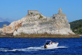 view from the boat to the church on the rock in the sea