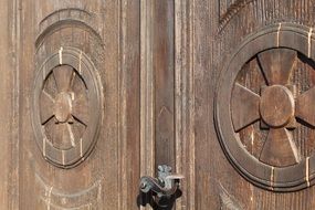 large wooden doors to the church