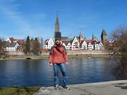 photo of man on the background of Ulm Cathedral