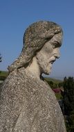 gray stone statue of Jesus