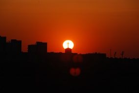 City the the bright red sunset