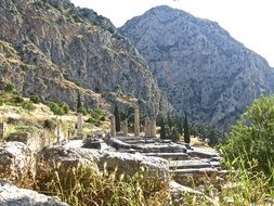 ruins of an ancient temple near the mountains